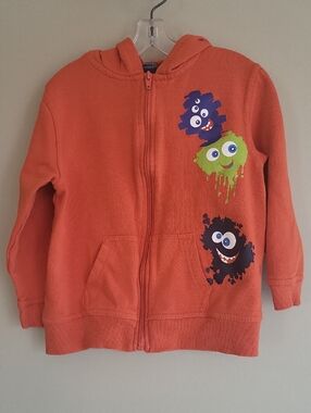 Orange monster zip up hoodie